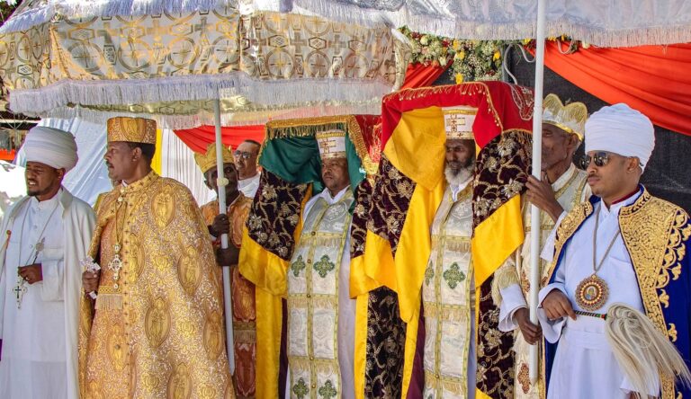 Clergy process with Tabots wrapped in rich velvet